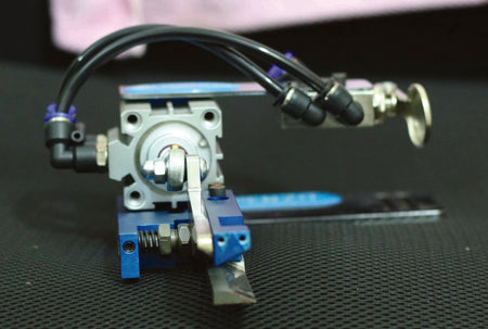 Tape Thread Cutting System with Button - Empenzo Automated Sewing Systems
