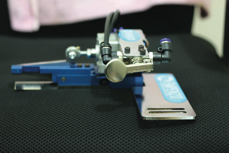 Tape Thread Cutting System with Button - Empenzo Automated Sewing Systems