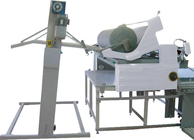 Fully Automatic Fabric Spreading Machine - Empenzo Automated Sewing Systems