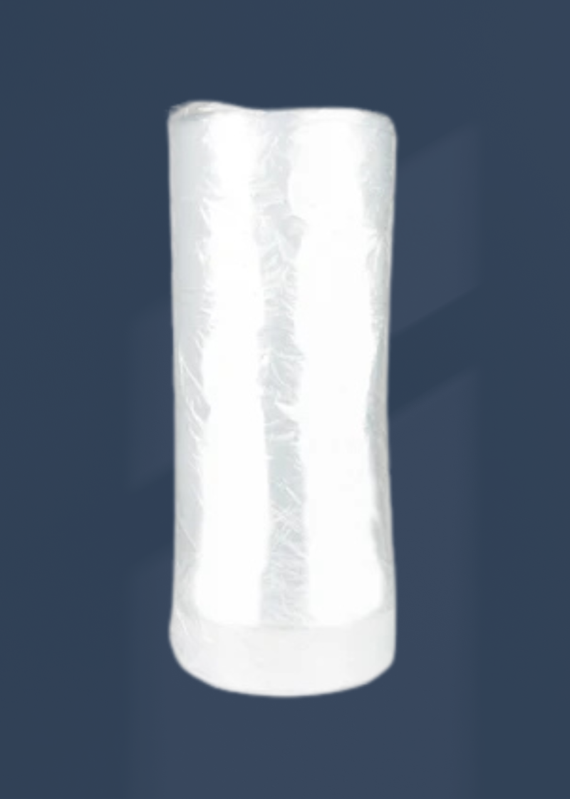 .6 mil. Regular Perforated Poly Garment Bags - 21" x 4" x 30" - 700/Roll - Clear