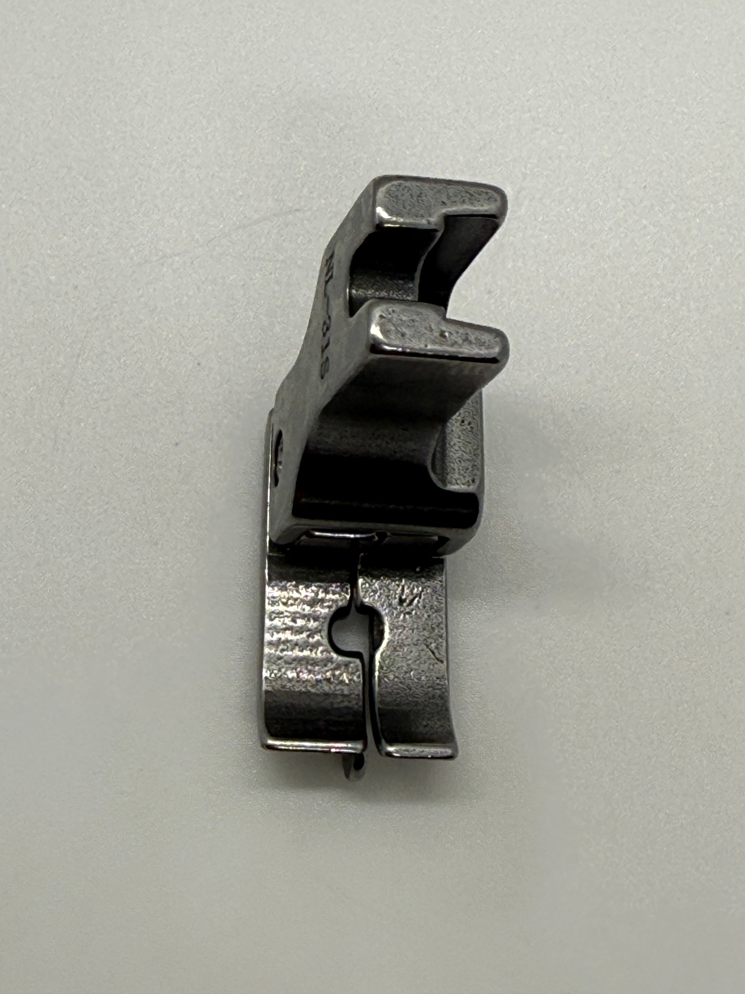 Left Close Seam Comp - Industrial Sewing Machine Part NL-31S
