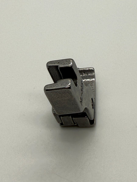Left Close Seam Comp - Industrial Sewing Machine Part NL-31S